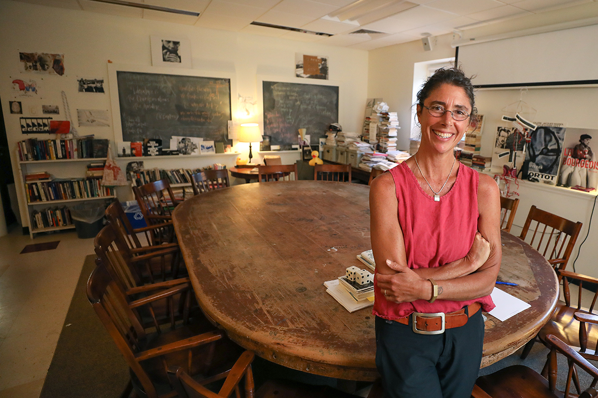 Instructor Mercy Carbonell stands in her classroom