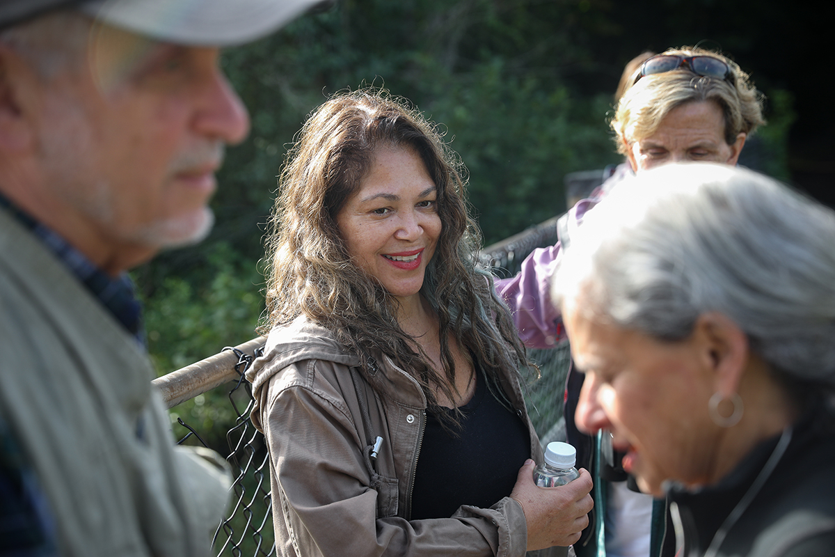 Sandra Guzman chats with her fellow birding society members