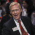 Portrait of Principal Bill Rawson smiling and laughing during an event.