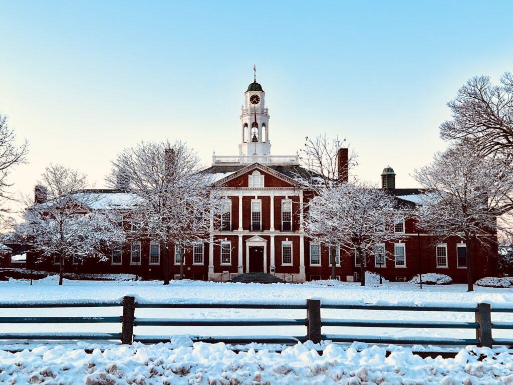 Snow covered lawn in front of the Academy Building