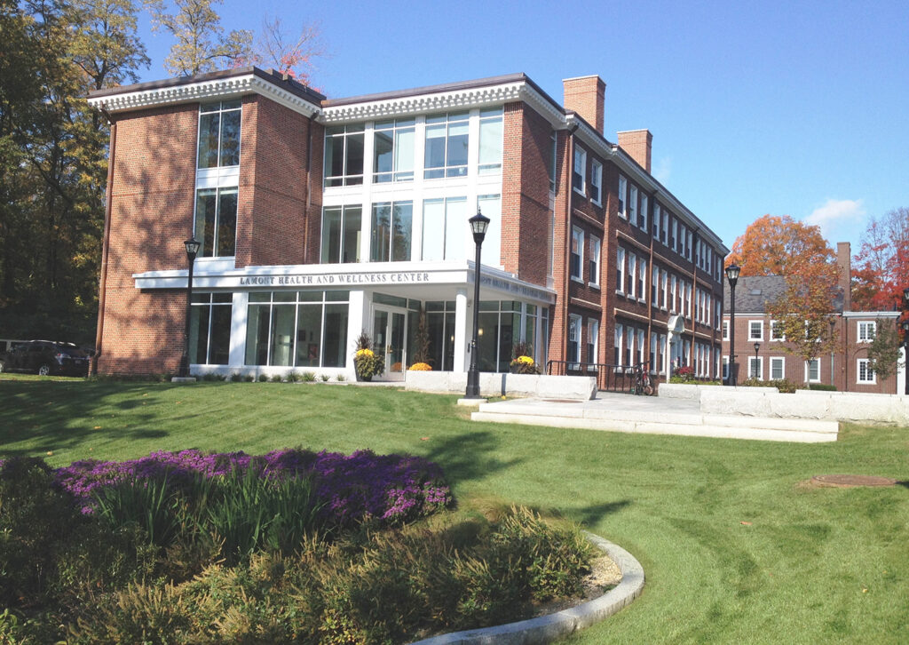 Lamont Health and Wellness center featuring a brick exterior and green lawn