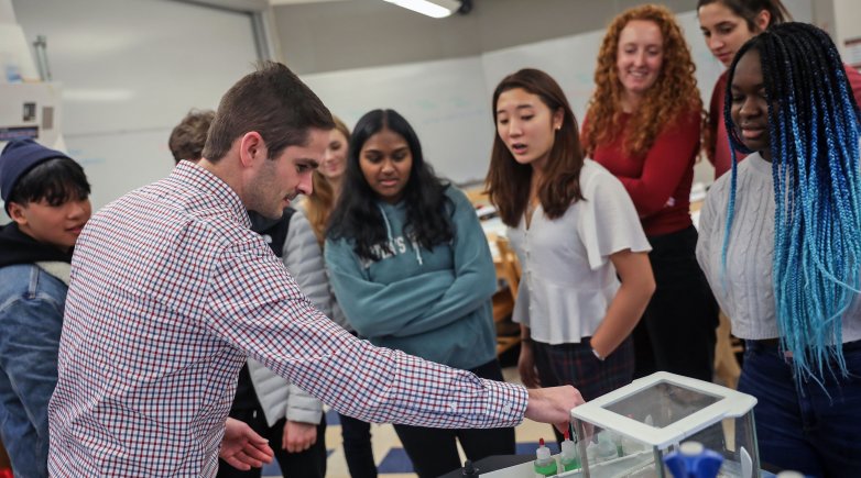 Instructor Andrew McTammany leads a chemistry class