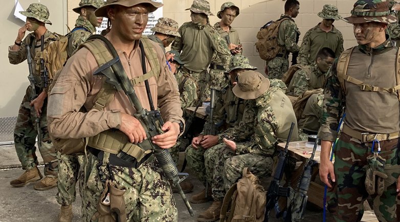 Justin Rigg '23 stands with his classmates in the Naval Special Warfare Orientation Course.