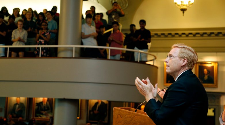 Interim Principal Bill Rawson '71; P'08 applauds the student body during opening assembly Friday, Sept. 7, 2018.