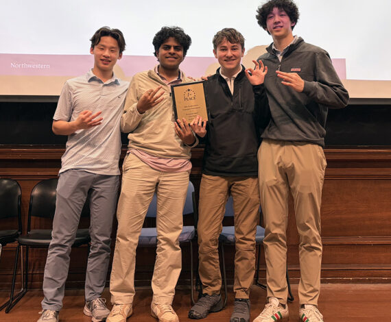 image for Econ team rolls to threepeat