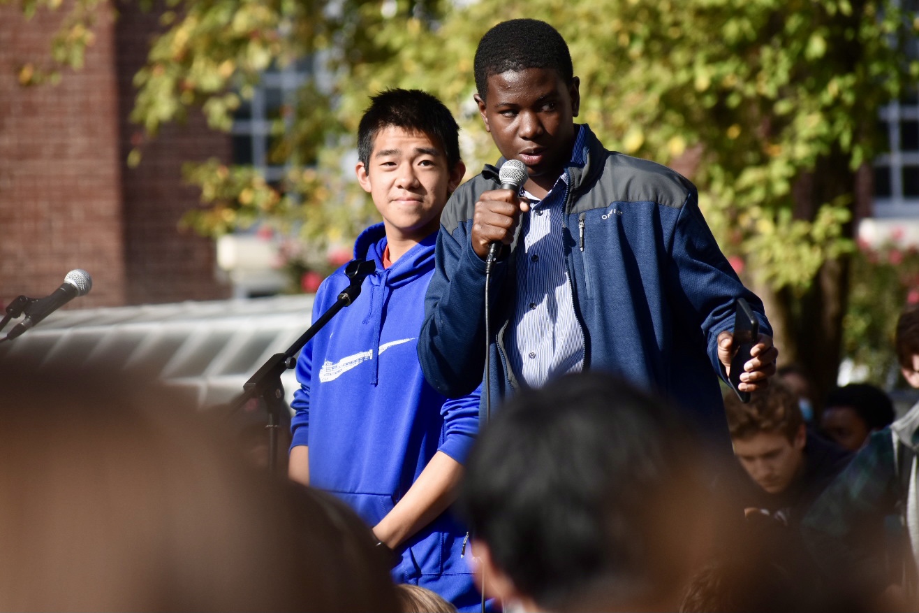 David Chen '23 and E.J. Barthelemy '23 pitch their Core Values Project idea to schoolmates. 