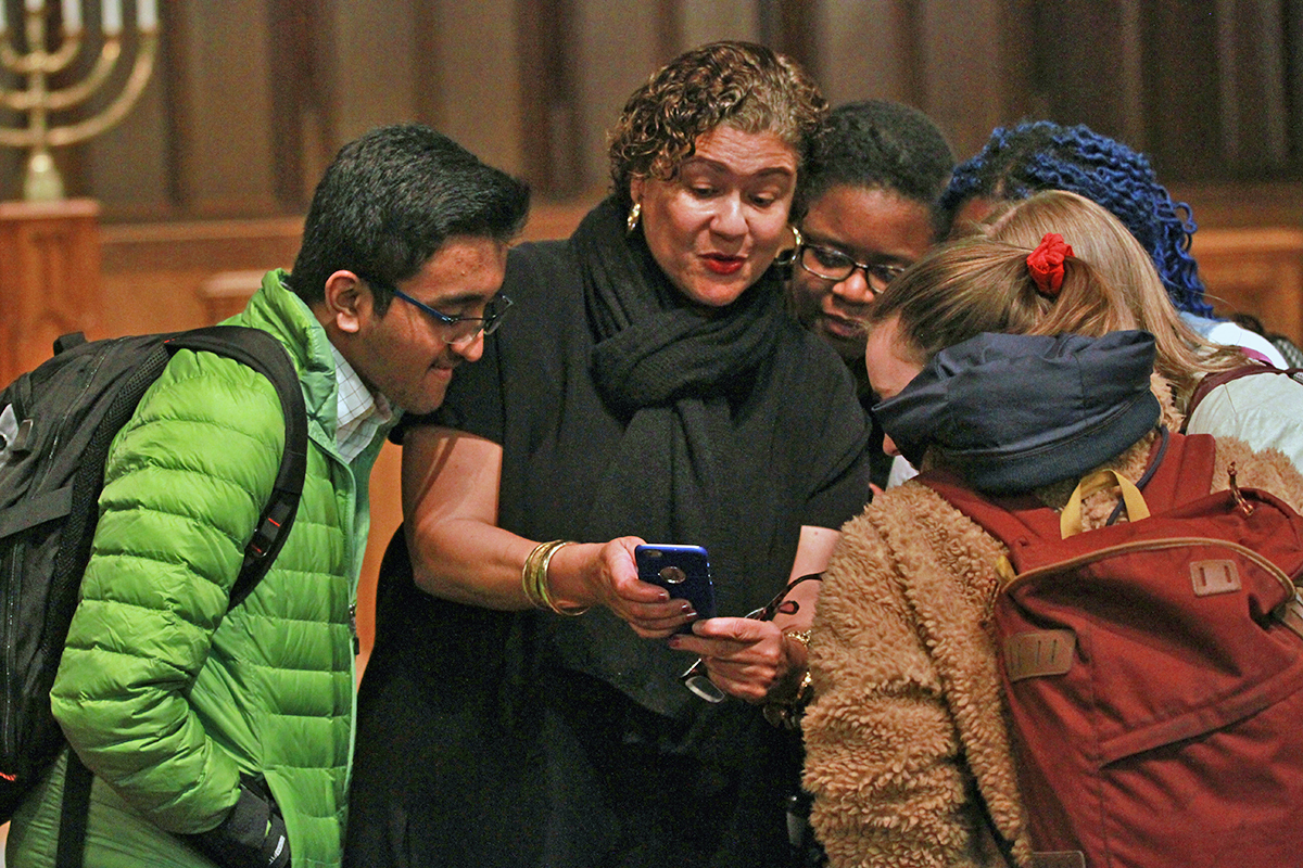 Alexander and students share stories after a Q&A in Phillips Church.