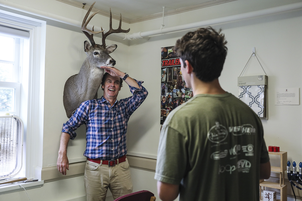 Charlie Lavallee and his dad admire his mounted deer bust