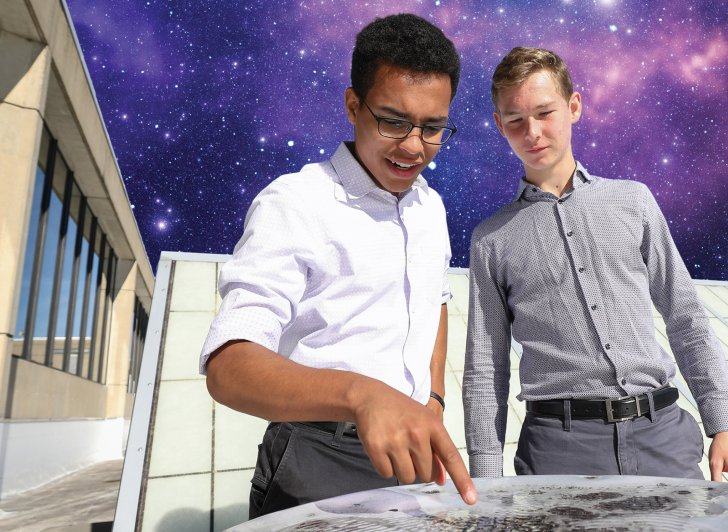 Avery Clowes and Billy Menken on the roof of Love Gym at Phillips Exeter Academy