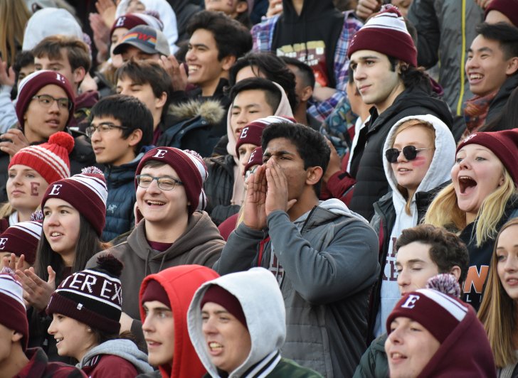 A crowd of Exeter students cheers for Big Red in Love Gym.