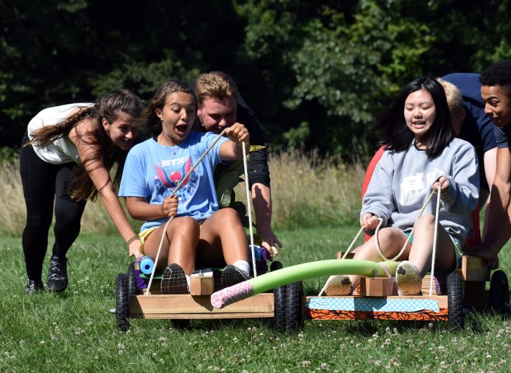 Members of the class of 2021 race go-karts of their own making during Class Activity Day at Alnoba in Kensington. 
