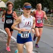 Fiona running in a marathon.