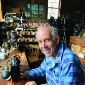 Robert Mathews '69 in his shoemaking workshop 
