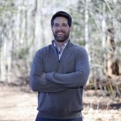 Exeter's Manager of Sustainability Warren Biggins at trailhead of Exeters trail network