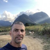 Wolff Klabin standing in front of a mountain range.