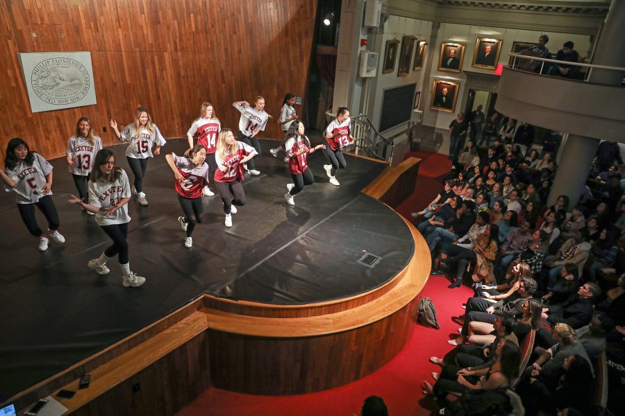 Students dancing on Assembly Hall stage at Phillips Exeter Academy.
