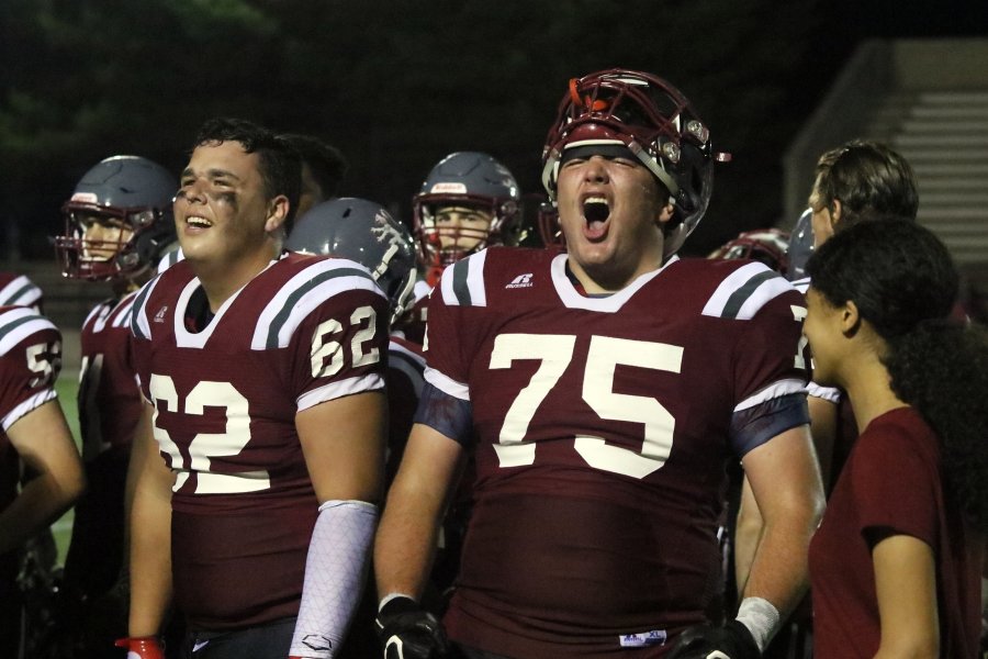 David Barr '20 (left) and Ethan Rosenthal '20 celebrate a victory Friday night. 