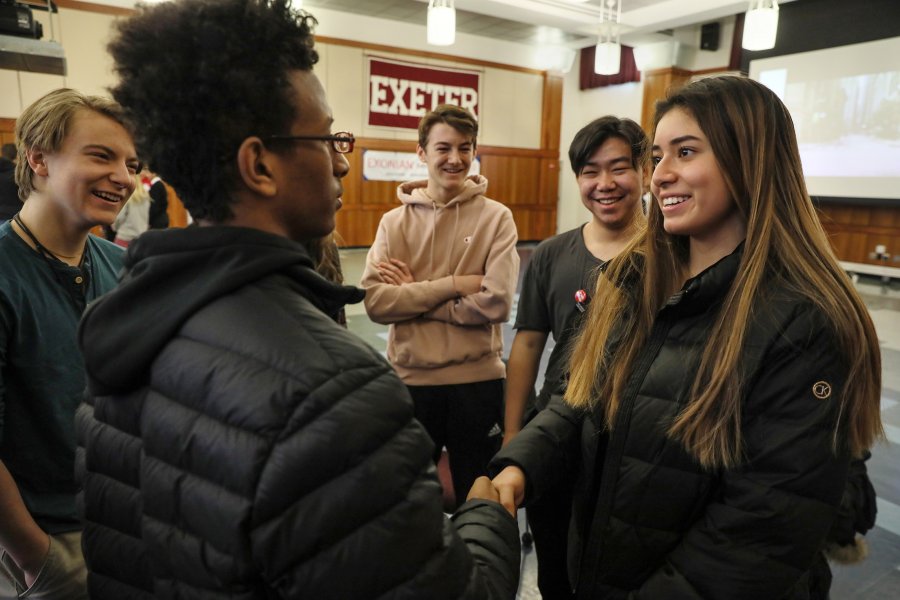 Exeter students greet a speaker at MLK Day 2020.