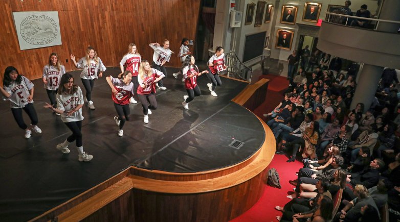 Students dancing on Assembly Hall stage at Phillips Exeter Academy.
