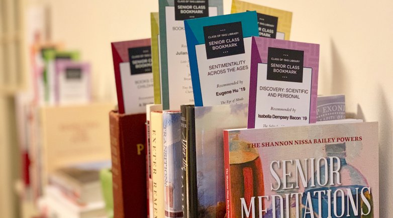 Books sporting senior bookmarks on display at the Phillips Exeter Library.