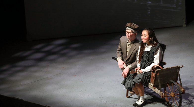 Two actors perform a scene from The Secret Garden.