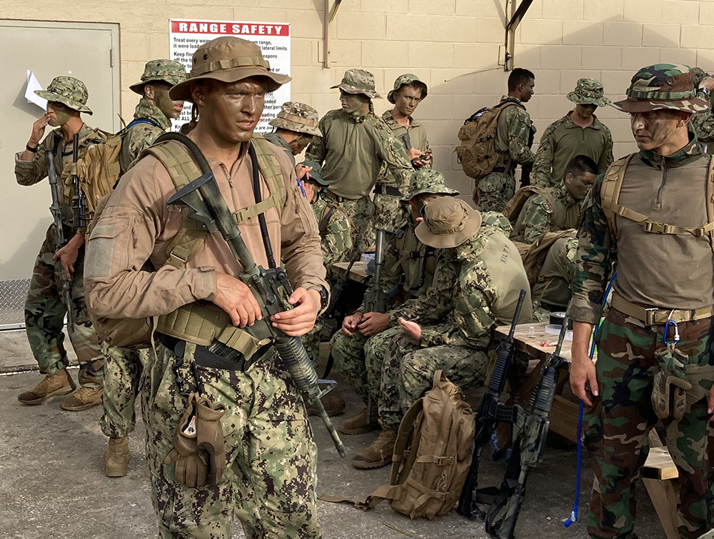 Justin Rigg '23 stands with his classmates in the Naval Special Warfare Orientation Course.