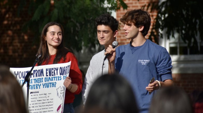 Juliet Ortiz, Niko Matheos and Georgie Venci address the crowd.